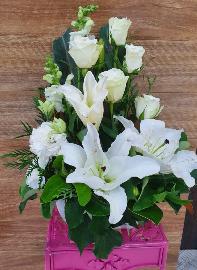 Evelyn - A fabulous collection of white and cream flowers make this the perfect gift .
