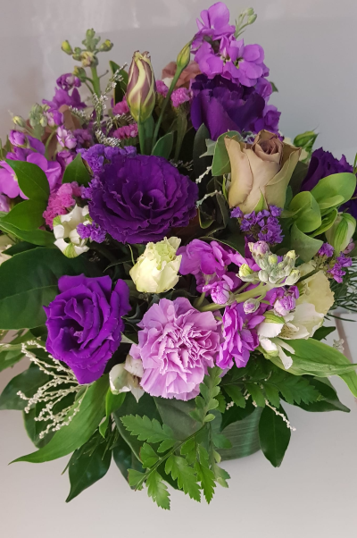 Cool Breeze - This classical stylish collection of flowers, make this hand tied the perfect gift. Flowers professionally arranged and delivered by a local florist.