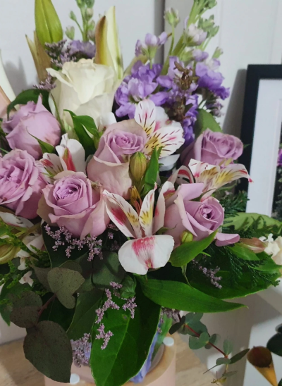 Sugar Rush - This gorgeous hand-tied bouquet of sweet pastel shades is sure to bring joy and delight. Crammed with beautiful flowers guaranteed to put a boost into any occasion.